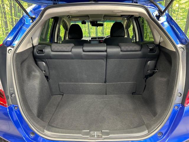 フィット 13G・Fパッケージ SDナビ バックカメラ?シティブレーキアクティブシステム 禁煙車 前後ドライブレコーダー スマートキー ETC Bluetooth再生 CD/DVD再生 フルセグ ステアリングスイッチ(56枚目)