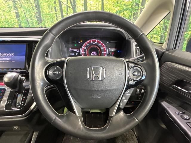 オデッセイ アブソルート・Xホンダセンシング フリップダウンモニター 両側電動ドア 純正8インチSDナビ バックカメラ レーダークルーズ 禁煙車 ハーフレザーシート パワーシート LEDヘッド ビルトインETC 車線逸脱警報 オートライト(11枚目)