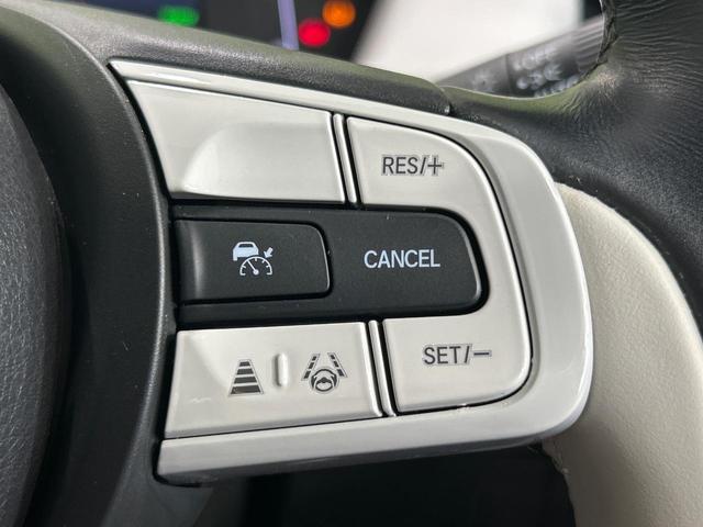フィット ｅ：ＨＥＶホーム　ＳＤナビ　バックカメラ　ホンダセンシング　レーダークルーズ　禁煙車　ハーフレザーシート　コーナーセンサー　レーンキープ　スマートキー　ＬＥＤヘッド　ＥＴＣ　オートブレーキホールド　オートライト（6枚目）