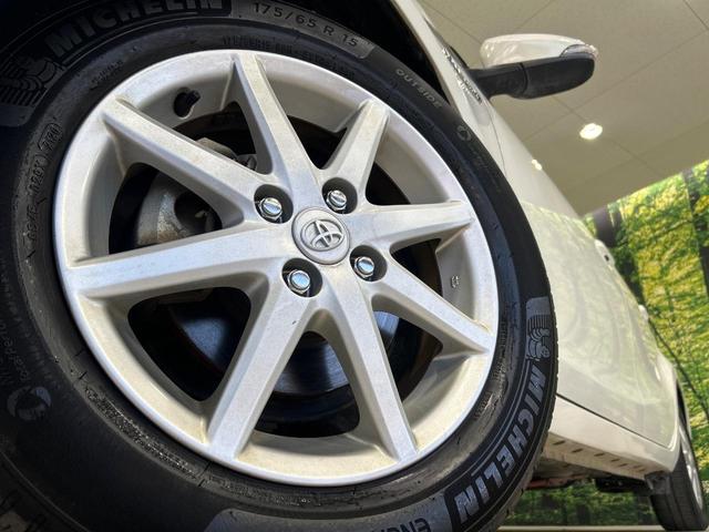 アクア G SDナビ スマートキー ETC オートライト オートエアコン 純正15インチアルミ CD/DVD再生 革巻きステアリング 電動格納ミラー(13枚目)