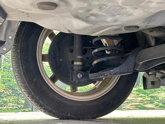 アクア G SDナビ スマートキー ETC オートライト オートエアコン 純正15インチアルミ CD/DVD再生 革巻きステアリング 電動格納ミラー(23枚目)