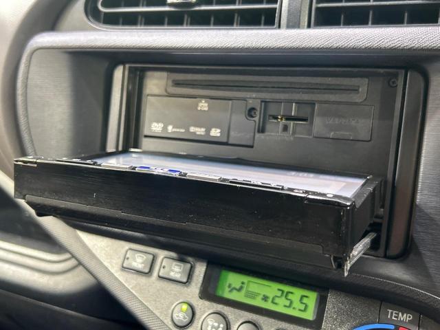 アクア G SDナビ スマートキー ETC オートライト オートエアコン 純正15インチアルミ CD/DVD再生 革巻きステアリング 電動格納ミラー(27枚目)