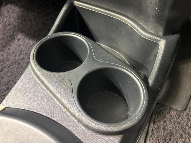 アクア G SDナビ スマートキー ETC オートライト オートエアコン 純正15インチアルミ CD/DVD再生 革巻きステアリング 電動格納ミラー(42枚目)