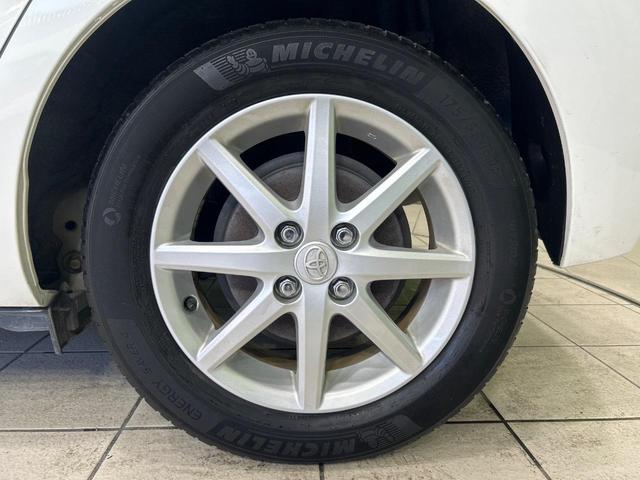 アクア G SDナビ スマートキー ETC オートライト オートエアコン 純正15インチアルミ CD/DVD再生 革巻きステアリング 電動格納ミラー(53枚目)