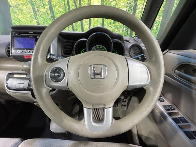 Ｎ－ＢＯＸ Ｇ・Ｌパッケージ　電動スライドドア　禁煙車　スマートキー　純正１４インチアルミ　オートエアコン　ＣＤ　ステアリングスイッチ　横滑り防止装置　ヘッドライトレベライザー　トップシェードガラス　プライバシーガラス（11枚目）