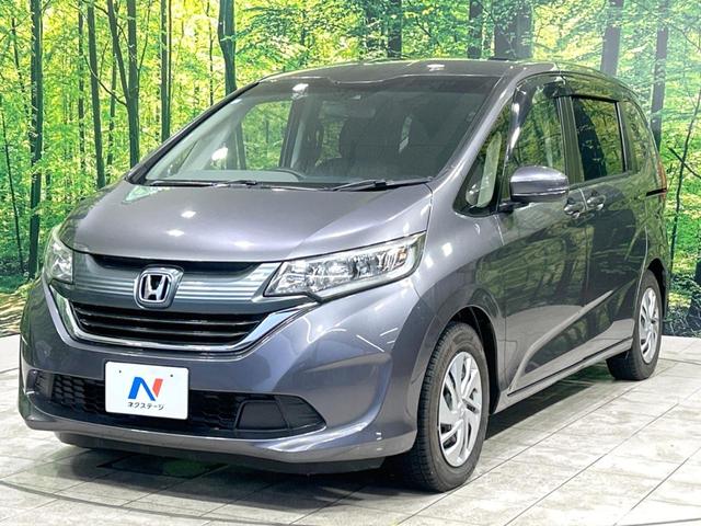 フリード Ｇ・ホンダセンシング　後席モニター　純正ナビ　禁煙車　ホンダセンシング　両側電動ドア　バックカメラ　レーダークルーズ　フルセグ　ＥＴＣ　Ｂｌｕｅｔｏｏｔｈ　誤発進抑制機能　車線逸脱警報　先行車発進お知らせ（21枚目）