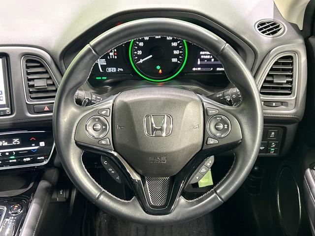 ヴェゼル ハイブリッドＺ・ホンダセンシング　後期　純正８型ナビ　バックカメラ　シ－トヒ－タ－　ハ－フレザ－シ－ト　ホンダセンシング　アダプティブクルーズコントロール　ＬＥＤヘッドライト　Ｂｌｕｅｔｏｏｔｈ　禁煙車　ワンオーナー（11枚目）
