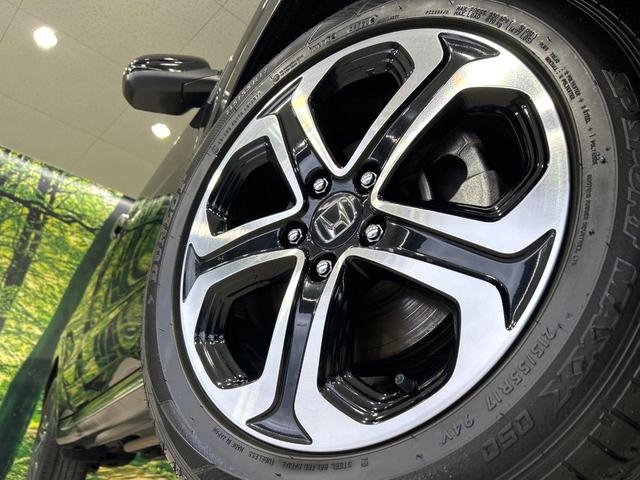 ヴェゼル ハイブリッドＺ・ホンダセンシング　後期　純正８型ナビ　バックカメラ　シ－トヒ－タ－　ハ－フレザ－シ－ト　ホンダセンシング　アダプティブクルーズコントロール　ＬＥＤヘッドライト　Ｂｌｕｅｔｏｏｔｈ　禁煙車　ワンオーナー（13枚目）