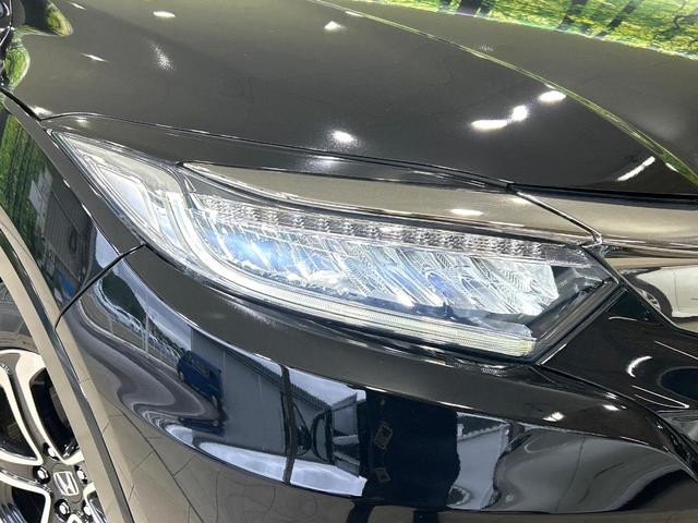 ヴェゼル ハイブリッドＺ・ホンダセンシング　後期　純正８型ナビ　バックカメラ　シ－トヒ－タ－　ハ－フレザ－シ－ト　ホンダセンシング　アダプティブクルーズコントロール　ＬＥＤヘッドライト　Ｂｌｕｅｔｏｏｔｈ　禁煙車　ワンオーナー（32枚目）