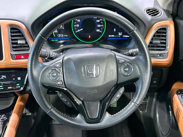 ヴェゼル ハイブリッドＺ　純正ナビ　バックカメラ　衝突被害軽減　禁煙車　ルーフレール　ハーフレザーシート　コーナーセンサー　スマートキー　ＬＥＤ　シートヒーター　ＥＴＣ　クルコン　ワンオーナー　オートライト　デュアルエアコン（11枚目）