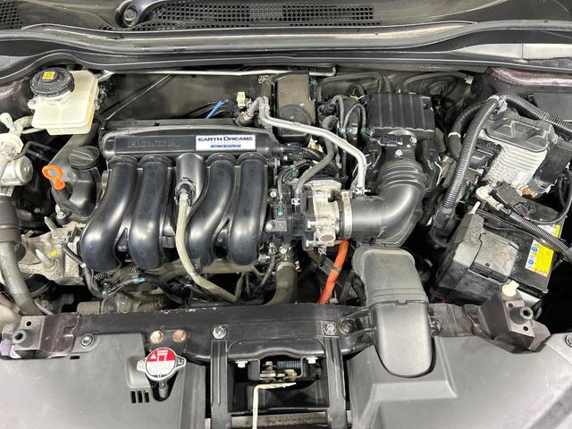 ヴェゼル ハイブリッドＺ　純正ナビ　バックカメラ　衝突被害軽減　禁煙車　ルーフレール　ハーフレザーシート　コーナーセンサー　スマートキー　ＬＥＤ　シートヒーター　ＥＴＣ　クルコン　ワンオーナー　オートライト　デュアルエアコン（18枚目）