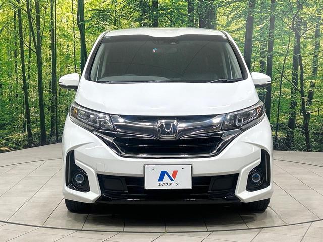 フリードハイブリッド ハイブリッド・Gホンダセンシング 純正9型ナビ バックカメラ 両側パワスラ ホンダセンシング アダプティブクルーズコントロール ドラレコ ETC LEDヘッドライト Bluetooth 革調シートカバー 禁煙車 ワンオーナー(15枚目)