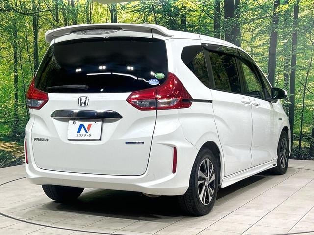 フリードハイブリッド ハイブリッド・Gホンダセンシング 純正9型ナビ バックカメラ 両側パワスラ ホンダセンシング アダプティブクルーズコントロール ドラレコ ETC LEDヘッドライト Bluetooth 革調シートカバー 禁煙車 ワンオーナー(18枚目)