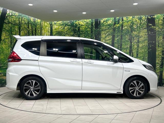 フリードハイブリッド ハイブリッド・Gホンダセンシング 純正9型ナビ バックカメラ 両側パワスラ ホンダセンシング アダプティブクルーズコントロール ドラレコ ETC LEDヘッドライト Bluetooth 革調シートカバー 禁煙車 ワンオーナー(57枚目)