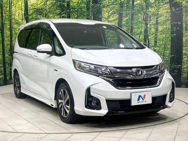 フリードハイブリッド ハイブリッド・Gホンダセンシング 純正9型ナビ バックカメラ 両側パワスラ ホンダセンシング アダプティブクルーズコントロール ドラレコ ETC LEDヘッドライト Bluetooth 革調シートカバー 禁煙車 ワンオーナー(58枚目)