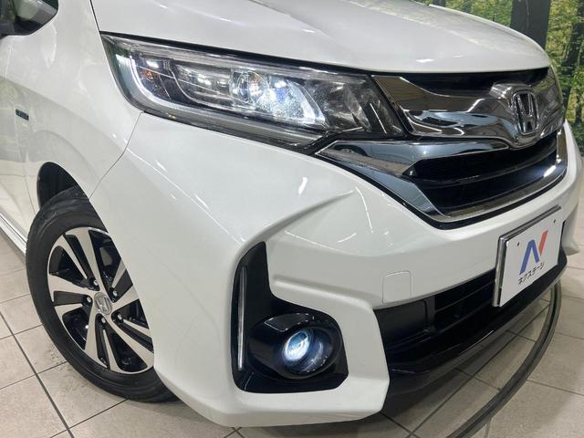 フリードハイブリッド ハイブリッド・Gホンダセンシング 純正9型ナビ バックカメラ 両側パワスラ ホンダセンシング アダプティブクルーズコントロール ドラレコ ETC LEDヘッドライト Bluetooth 革調シートカバー 禁煙車 ワンオーナー(59枚目)