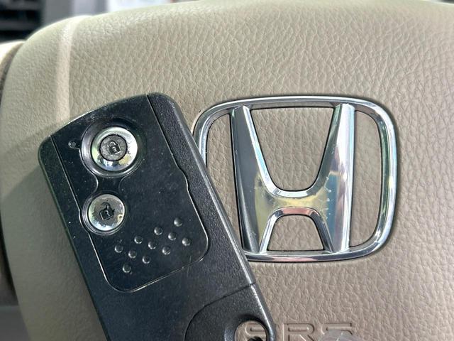 ライフ パステル 純正ディスプレイ バックカメラ スマートキー オートエアコン CD再生 電動格納ミラー バニティーミラー シートリフター イモビライザー ワンオーナー 禁煙車(4枚目)