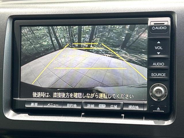 ステップワゴンスパーダ Z 純正ナビ フリップダウンモニター バックカメラ 両側パワスラ スマートキー ETC HIDヘッドライト 純正16インチAW CD/DVD再生 フルセグ 革巻きステアリング 禁煙車 ワンオーナー(5枚目)