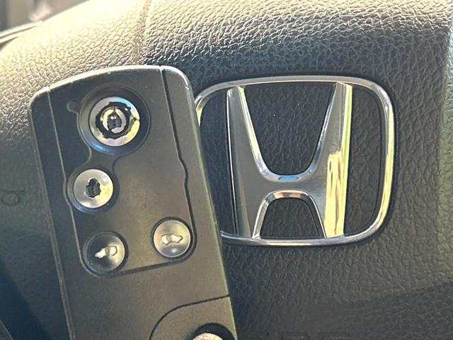 ステップワゴンスパーダ Z 純正ナビ フリップダウンモニター バックカメラ 両側パワスラ スマートキー ETC HIDヘッドライト 純正16インチAW CD/DVD再生 フルセグ 革巻きステアリング 禁煙車 ワンオーナー(31枚目)