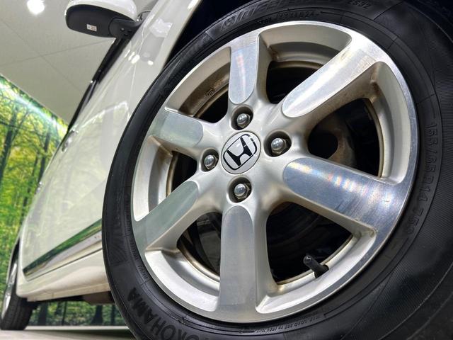 Ｎ－ＯＮＥ プレミアム・Ｌパッケージ　禁煙車　ナビ　バックカメラ　ＨＩＤヘッドライト　スマートキー　オートライト　オートエアコン　ＣＤ／ＤＶＤ再生　革巻きステアリング　フォグライト　地デジ　プライバシーガラス　ワンオーナー（12枚目）