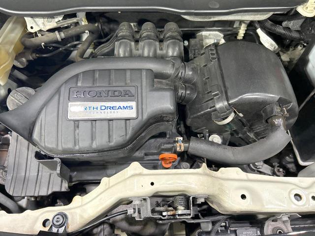 Ｎ－ＯＮＥ プレミアム・Ｌパッケージ　禁煙車　ナビ　バックカメラ　ＨＩＤヘッドライト　スマートキー　オートライト　オートエアコン　ＣＤ／ＤＶＤ再生　革巻きステアリング　フォグライト　地デジ　プライバシーガラス　ワンオーナー（17枚目）