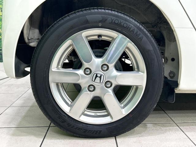 Ｎ－ＯＮＥ プレミアム・Ｌパッケージ　禁煙車　ナビ　バックカメラ　ＨＩＤヘッドライト　スマートキー　オートライト　オートエアコン　ＣＤ／ＤＶＤ再生　革巻きステアリング　フォグライト　地デジ　プライバシーガラス　ワンオーナー（26枚目）