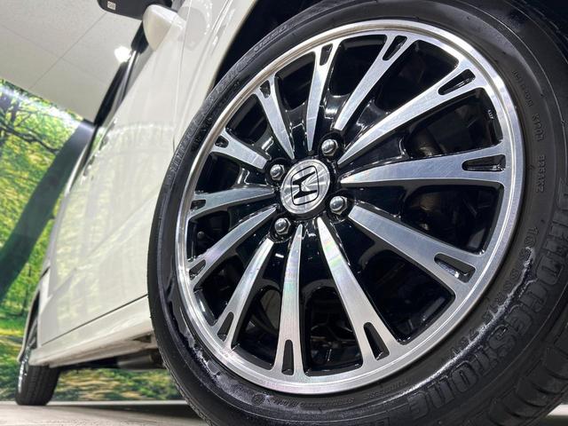 Ｎ－ＢＯＸカスタム Ｇ・ターボパッケージ　ナビ　バックカメラ　両側パワスラ　クルーズコントロール　ＨＩＤヘッドライト　スマートキー　ＥＴＣ　純正１５インチＡＷ　オートエアコン　ＣＤ／ＤＶＤ再生　革巻きステアリング　禁煙車　ワンオーナー（13枚目）