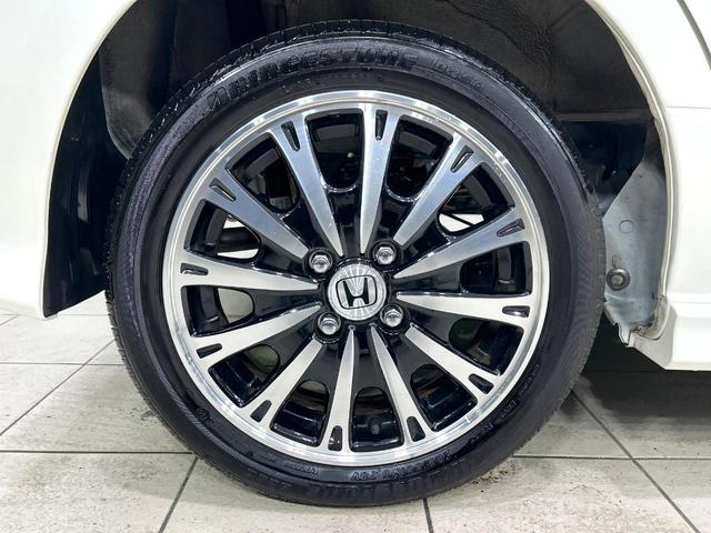 Ｎ－ＢＯＸカスタム Ｇ・ターボパッケージ　ナビ　バックカメラ　両側パワスラ　クルーズコントロール　ＨＩＤヘッドライト　スマートキー　ＥＴＣ　純正１５インチＡＷ　オートエアコン　ＣＤ／ＤＶＤ再生　革巻きステアリング　禁煙車　ワンオーナー（24枚目）