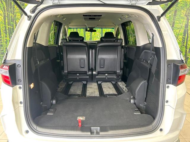 オデッセイハイブリッド ハイブリッドアブソルート・ホンダセンシングＥＸパック　純正ナビ　フリップダウンモニター　バックカメラ　両側パワスラ　ホンダセンシング　アダプティブクルーズコントロール　ドラレコ　ＥＴＣ　ＬＥＤヘッドライト　ハーフレザーシート　純正１７インチＡＷ　禁煙車（12枚目）