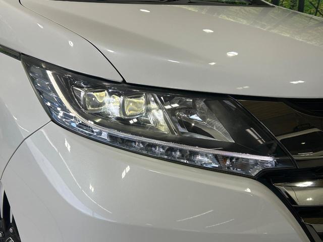 オデッセイハイブリッド ハイブリッドアブソルート・ホンダセンシングＥＸパック　純正ナビ　フリップダウンモニター　バックカメラ　両側パワスラ　ホンダセンシング　アダプティブクルーズコントロール　ドラレコ　ＥＴＣ　ＬＥＤヘッドライト　ハーフレザーシート　純正１７インチＡＷ　禁煙車（34枚目）