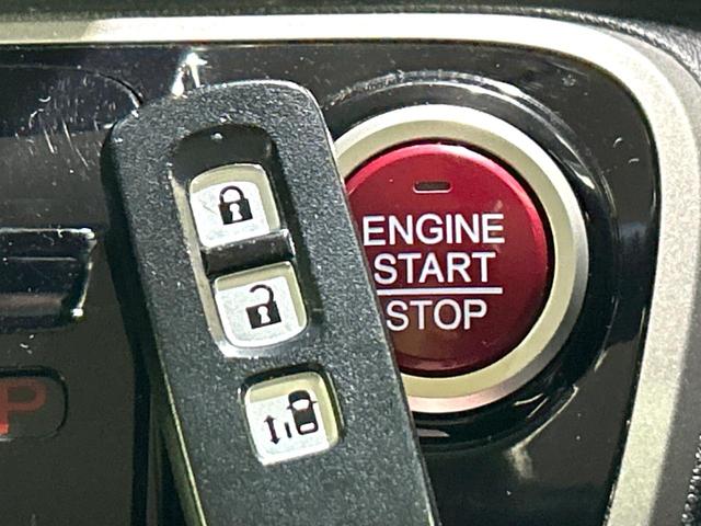 Ｎ－ＢＯＸ ２トーンカラースタイル　Ｇ・Ｌパッケージ　２トーンカラー　ナビ　バックカメラ　電動スライドドア　スマートキー　純正１４インチＡＷ　アイドリングストップ　オートエアコン　地デジ　プライバシーガラス　ドアバイザー　禁煙車　ワンオーナー（6枚目）