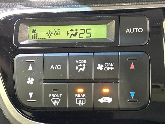 Ｎ－ＢＯＸ ２トーンカラースタイル　Ｇ・Ｌパッケージ　２トーンカラー　ナビ　バックカメラ　電動スライドドア　スマートキー　純正１４インチＡＷ　アイドリングストップ　オートエアコン　地デジ　プライバシーガラス　ドアバイザー　禁煙車　ワンオーナー（7枚目）