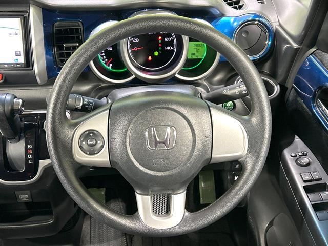 Ｎ－ＢＯＸ ２トーンカラースタイル　Ｇ・Ｌパッケージ　２トーンカラー　ナビ　バックカメラ　電動スライドドア　スマートキー　純正１４インチＡＷ　アイドリングストップ　オートエアコン　地デジ　プライバシーガラス　ドアバイザー　禁煙車　ワンオーナー（11枚目）