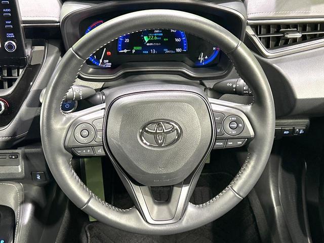 カローラツーリング ハイブリッド　ダブルバイビー　純正９型ナビ　バックカメラ　シ－トヒ－タ－　ハ－フレザ－シ－ト　セ－フティセンス　レーダークルーズコントロール　ＢＳＭ　ドラレコ　ＥＴＣ　ＬＥＤヘッドライト　Ｂｌｕｅｔｏｏｔｈ　禁煙車　ワンオーナー（11枚目）