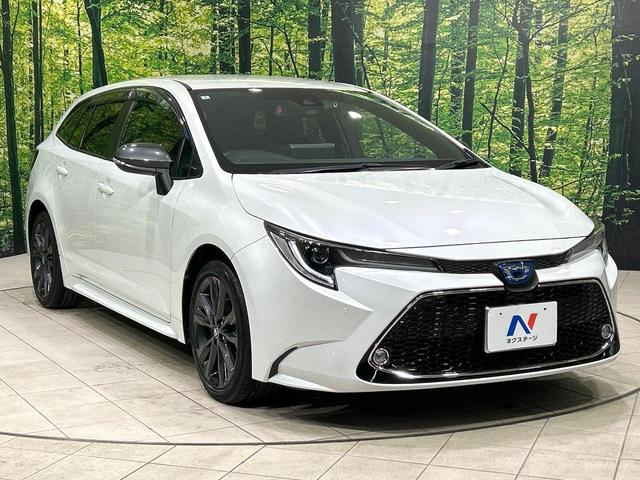 カローラツーリング ハイブリッド　ダブルバイビー　純正９型ナビ　バックカメラ　シ－トヒ－タ－　ハ－フレザ－シ－ト　セ－フティセンス　レーダークルーズコントロール　ＢＳＭ　ドラレコ　ＥＴＣ　ＬＥＤヘッドライト　Ｂｌｕｅｔｏｏｔｈ　禁煙車　ワンオーナー（16枚目）