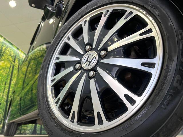 Ｎ－ＢＯＸカスタム Ｇ・ターボパッケージ　ナビ　両側パワスラ　クルーズコントロール　ＨＩＤヘッドライト　スマートキー　オ－トエアコン　Ｂｌｕｅｔｏｏｔｈ　純正１５インチＡＷ　革巻きステアリング　オートライト　禁煙車　ワンオーナー（13枚目）