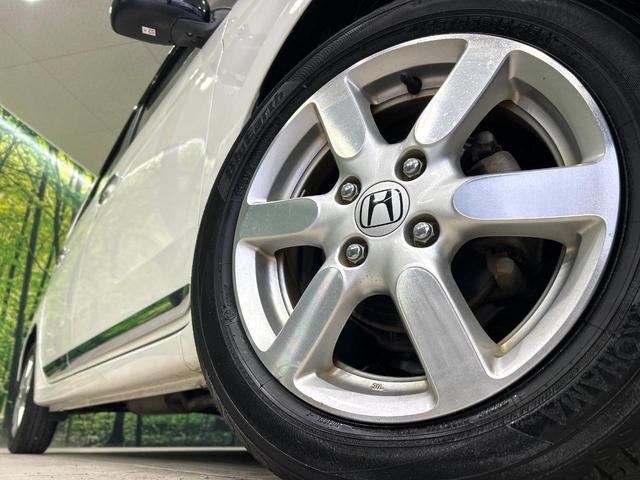 N-ONE プレミアム・Lパッケージ 2トーンカラー CDオーディオ HIDヘッドライト スマートキー オ-トエアコン 純正14インチAW フロントフォグランプ 禁煙車 ワンオーナー(12枚目)