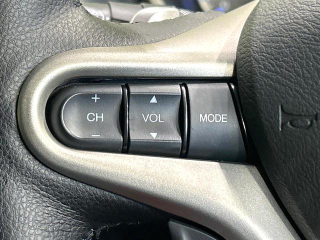 フィットハイブリッド ナビプレミアムセレクション　ガラスル－フ　純正ナビ　バックカメラ　クルーズコントロール　シ－トヒ－タ－　ＨＩＤヘッドライト　ＥＴＣ　純正１５インチＡＷ　スマートキー　パドルシフト　オートエアコン　ＣＤ／ＤＶＤ再生　地デジ　禁煙車（38枚目）