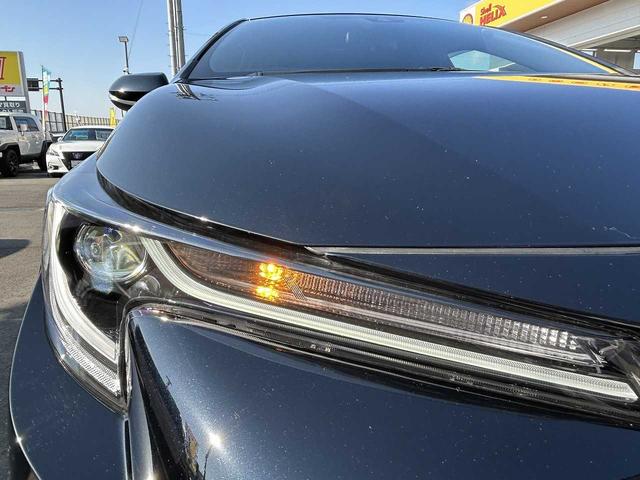 カローラスポーツ ハイブリッドＧ　フルセグ　Ｂｌｕｅｔｏｏｔｈ　バックカメラ　ＵＳＢ　ＥＴＣ　シートヒーター　クルコン　ＥＳＣ　レーンキープ　ＢＳＭ　ＲＣＴＡ　オートハイビーム　オートＬＥＤライト　衝突軽減ブレーキ　社外マフラー（57枚目）