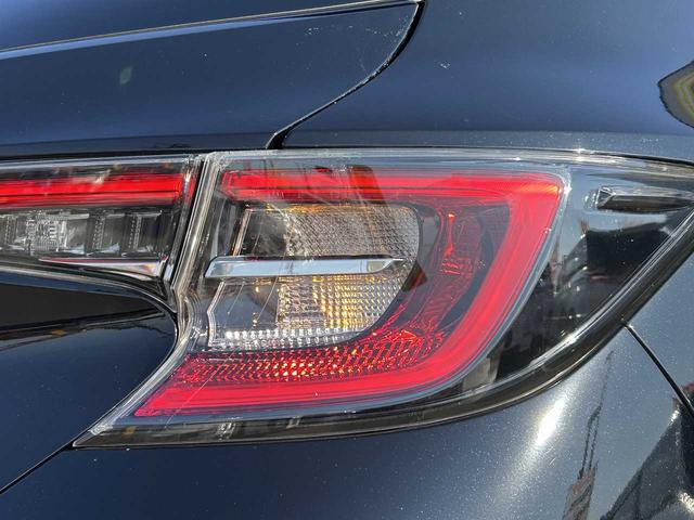 カローラスポーツ ハイブリッドＧ　フルセグ　Ｂｌｕｅｔｏｏｔｈ　バックカメラ　ＵＳＢ　ＥＴＣ　シートヒーター　クルコン　ＥＳＣ　レーンキープ　ＢＳＭ　ＲＣＴＡ　オートハイビーム　オートＬＥＤライト　衝突軽減ブレーキ　社外マフラー（64枚目）