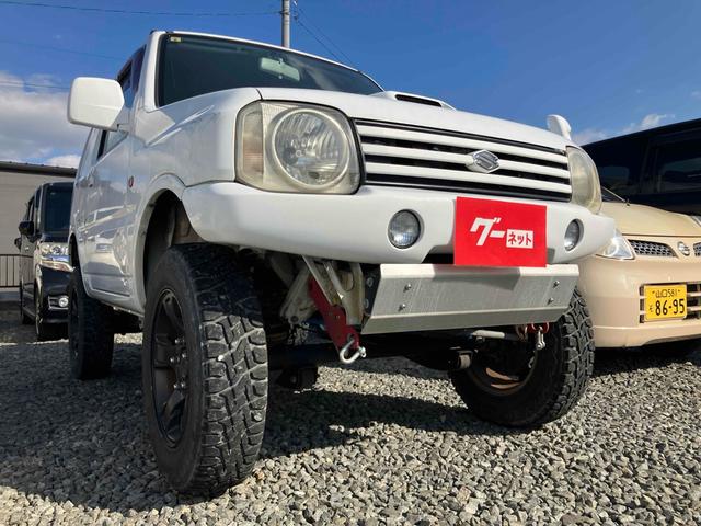 ジムニー Ｊ２　インタークーラーターボ　ＥＴＣ　キーレスエントリー　５速マニュアル（ＭＴ）　ＣＤ　リフトアップ　アルミホイール　衝突安全ボディ　エアバッグ（14枚目）