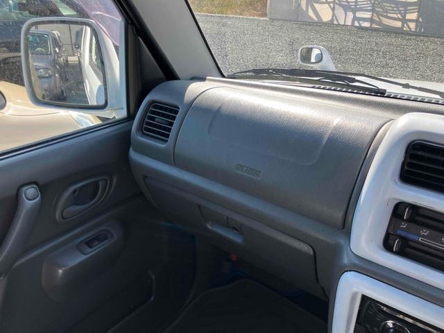 ジムニー Ｊ２　インタークーラーターボ　ＥＴＣ　キーレスエントリー　５速マニュアル（ＭＴ）　ＣＤ　リフトアップ　アルミホイール　衝突安全ボディ　エアバッグ（22枚目）