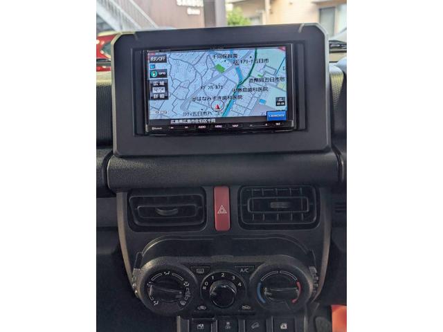 ジムニー ＸＧ　セーフティサポート装着車／デュアルセンサーブレーキサポート／インタークーラーターボ／パートタイム４ＷＤ／パナソニックワンセグナビＴＶ／バックカメラ／前後ドラレコ／キーレス（3枚目）