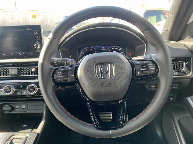 シビック ｅ：ＨＥＶ　☆ホンダセンシング☆ＢＯＳＥサウンド☆ナビＴＶ☆　ホンダセンシング☆９インチメーカーナビ☆Ｂｌｕｅｔｏｏｔｈ☆バックカメラ☆ＥＴＣ☆ＢＯＳＥサウンド☆ハーフレザーシート☆前席シートヒーター☆スマートキー☆プッシュスタート☆パドルシフト☆試乗ＯＫ（4枚目）