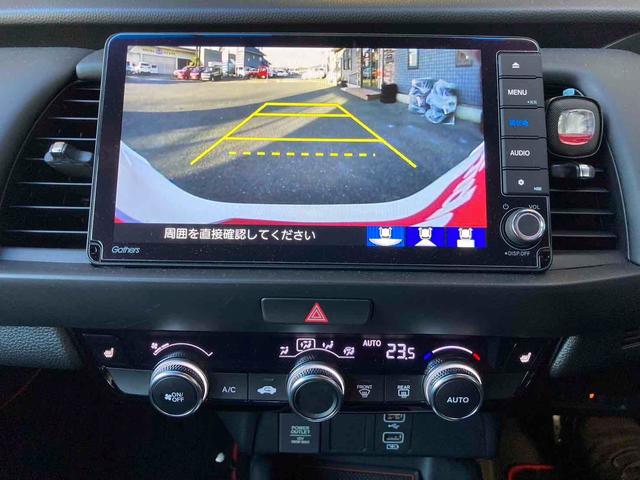 フィット e:HEVホーム ドライブレコーダー ETC バックカメラ ナビ TV クリアランスソナー オートクルーズコントロール アルミホイール オートライト スマートキー 電動格納ミラー ABS ESC CD DVD再生(3枚目)