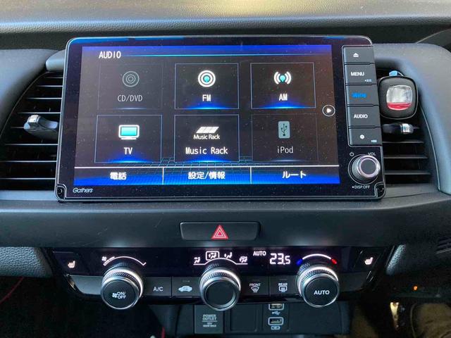 フィット e:HEVホーム ドライブレコーダー ETC バックカメラ ナビ TV クリアランスソナー オートクルーズコントロール アルミホイール オートライト スマートキー 電動格納ミラー ABS ESC CD DVD再生(5枚目)