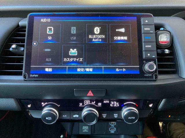 フィット e:HEVホーム ドライブレコーダー ETC バックカメラ ナビ TV クリアランスソナー オートクルーズコントロール アルミホイール オートライト スマートキー 電動格納ミラー ABS ESC CD DVD再生(6枚目)