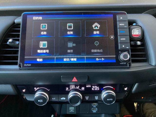 フィット e:HEVホーム ドライブレコーダー ETC バックカメラ ナビ TV クリアランスソナー オートクルーズコントロール アルミホイール オートライト スマートキー 電動格納ミラー ABS ESC CD DVD再生(25枚目)