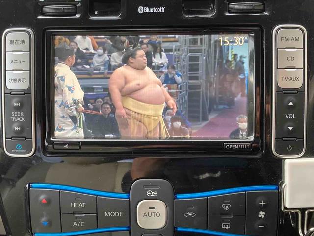 リーフ Ｇ　バックカメラ　ナビ　ＴＶ　オートクルーズコントロール　アルミホイール　電動格納ミラー　シートヒーター　ＣＶＴ　盗難防止システム　衝突安全ボディ　ＡＢＳ　ＥＳＣ　ＣＤ　ミュージックプレイヤー接続可（5枚目）