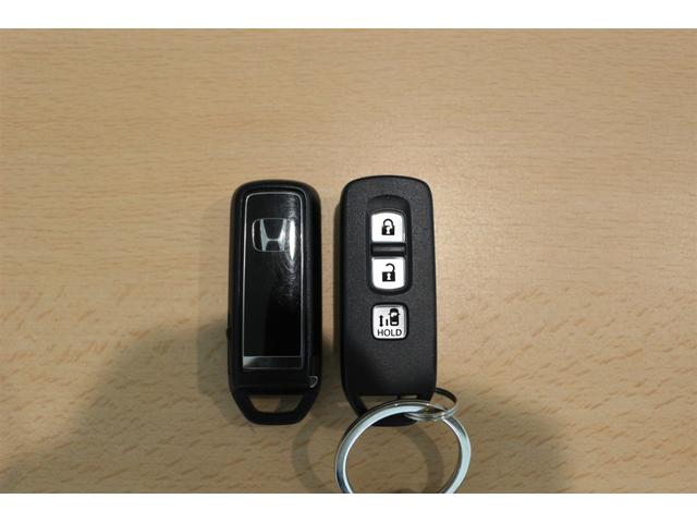 N-BOXカスタム L ホンダセンシング 障害物センサー 横滑り防止装置 充電用USBジャック パワースライドドア シートヒーター クルーズコントロール アルミホイール スマートキー(27枚目)